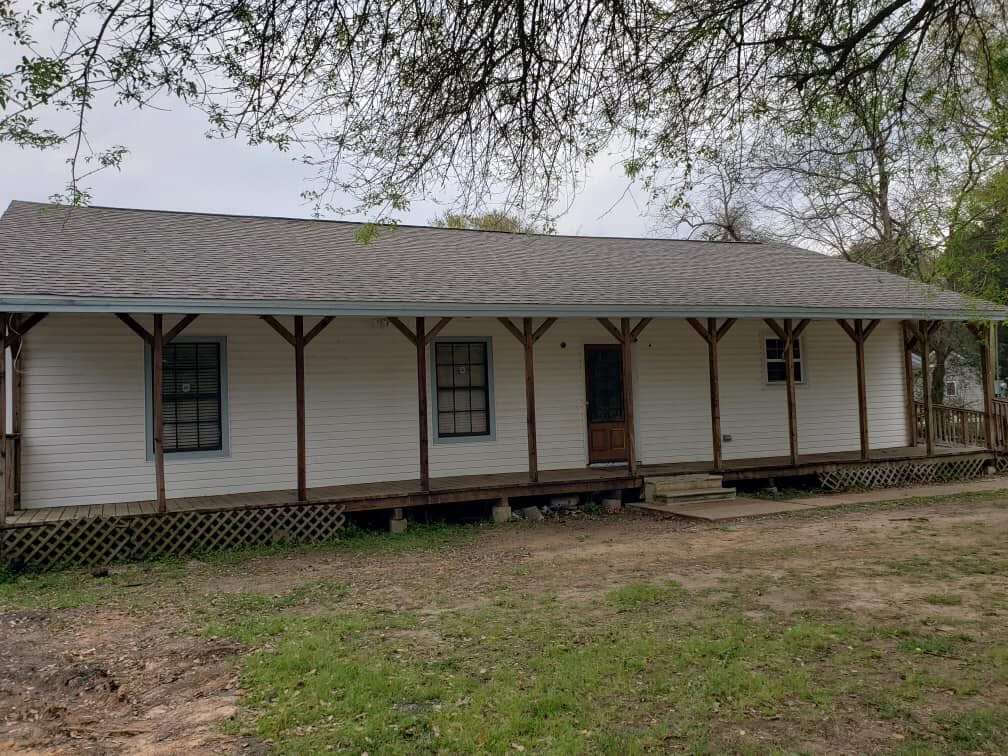 Exterior home before siding and paint update