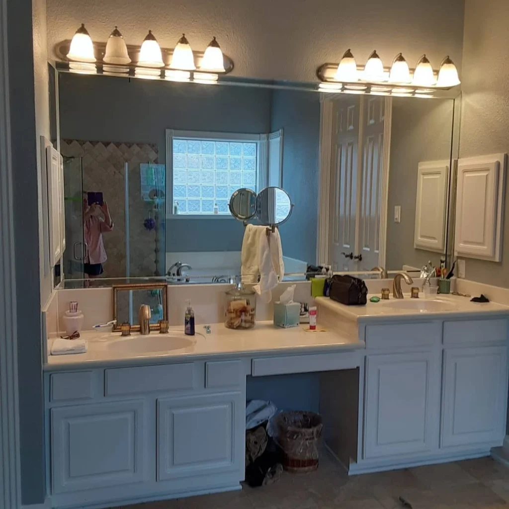 Luxury walk-in shower with glass enclosure and marble tile